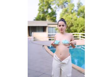 Urfi Javed poses topless whilst covering her assets only with rose ...