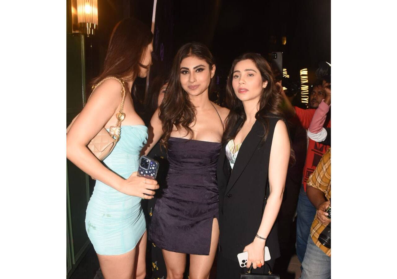 Disha Patani leaves her fans sweating with her deep, plunging neckline and body-hugging short dress.