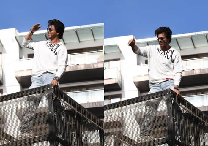 Shah Rukh Khan greets his fans who gathered around Mannat 