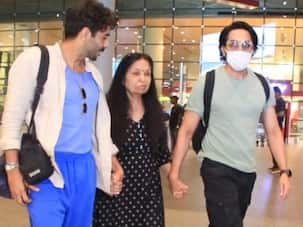 Ayushmann Khurrana, Aparshakti hold their mother's hands as they return home after father's demise