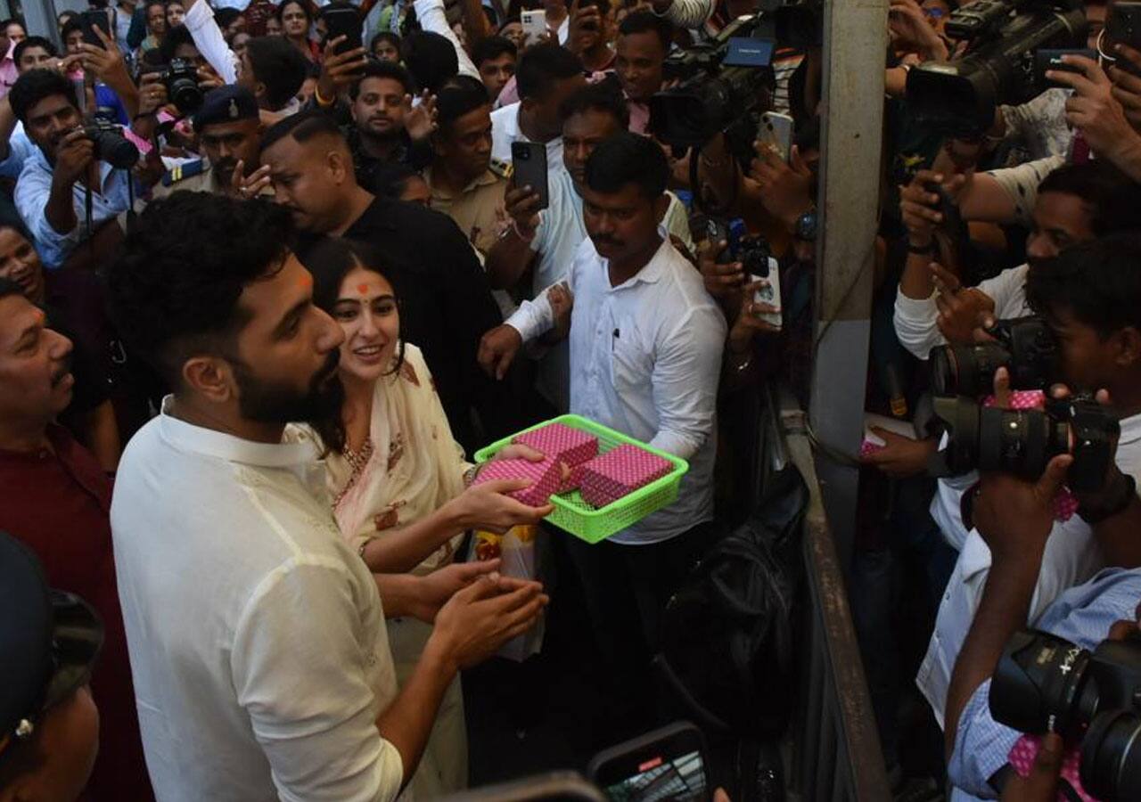 Sara Ali Khan and Vicky Kaushal surrounded by massive crowd