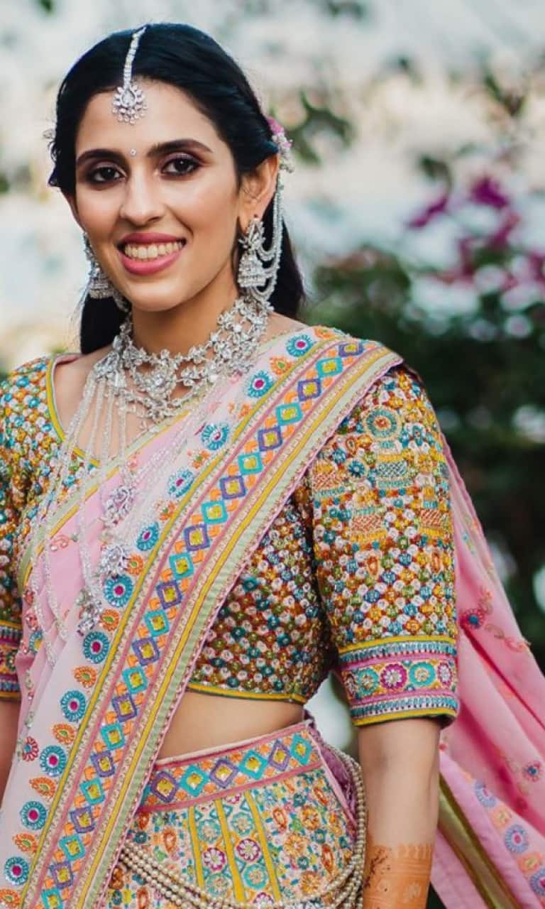 The Bride Donned A Peach-Coloured Lehenga With Floral Motifs, Styled It  With Double Organza Dupatta