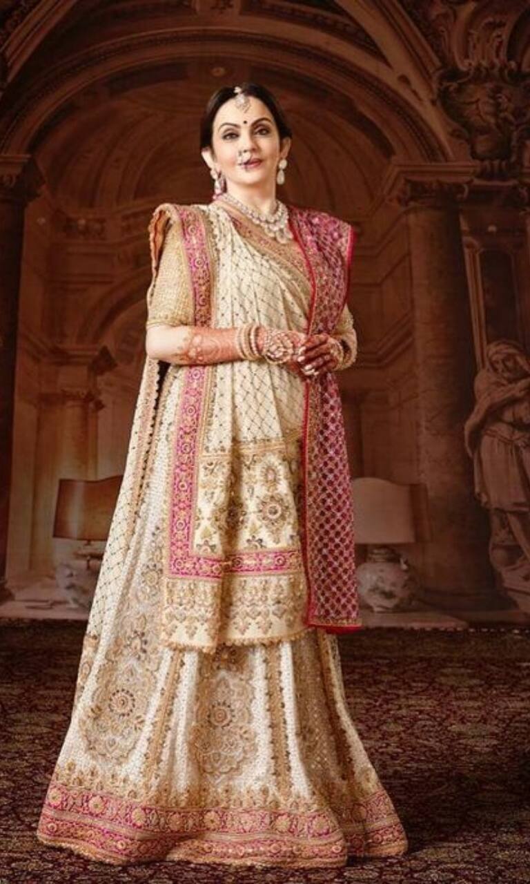 Peach embroidered lehenga with red blouse and pale orange dupatta available  only at Pernia's Pop Up Shop. 2024