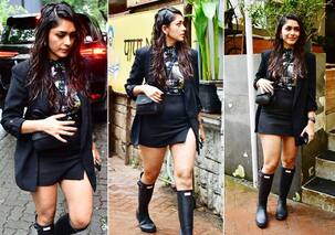 Mrunal Thakur oozes teenage girl vibes in a short skirt and long blazer on a rainy day in Mumbai