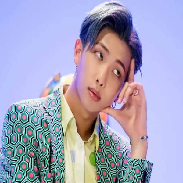 BTS leader RM aka Kim Namjoon mobbed at Milan airport; screaming crowd  makes it tough for security [Watch Video]