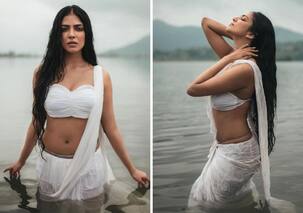 South Indian actress Malavika Mohanan takes a dip in the lake in a white saree, oozes oomph