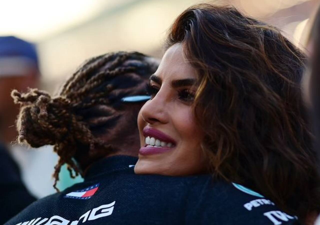 Priyanka Chopra hugs Lewis Hamilton at the Grand Prix 