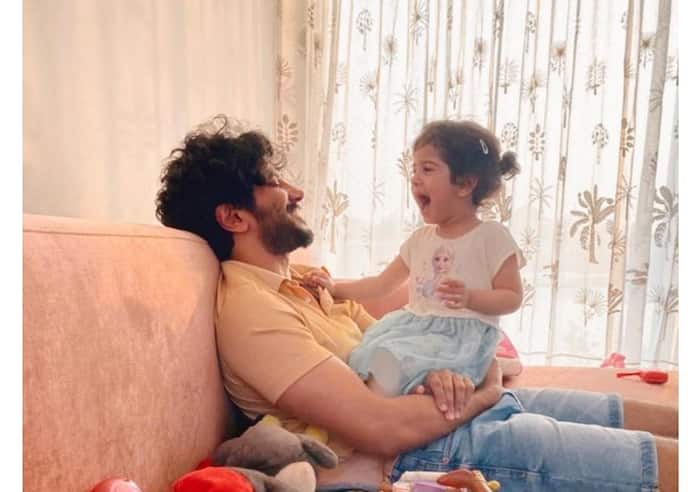 Dulquer Salmaan with his daughter