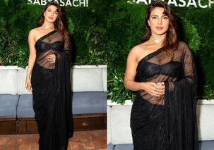 Priyanka Chopra makes heads turn in an off shoulder blouse with black sheer saree as she attends an event in LA [View Pics]