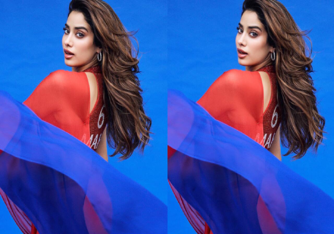 Janhvi Kapoor flaunts her well-toned body in a beautiful red and blue saree