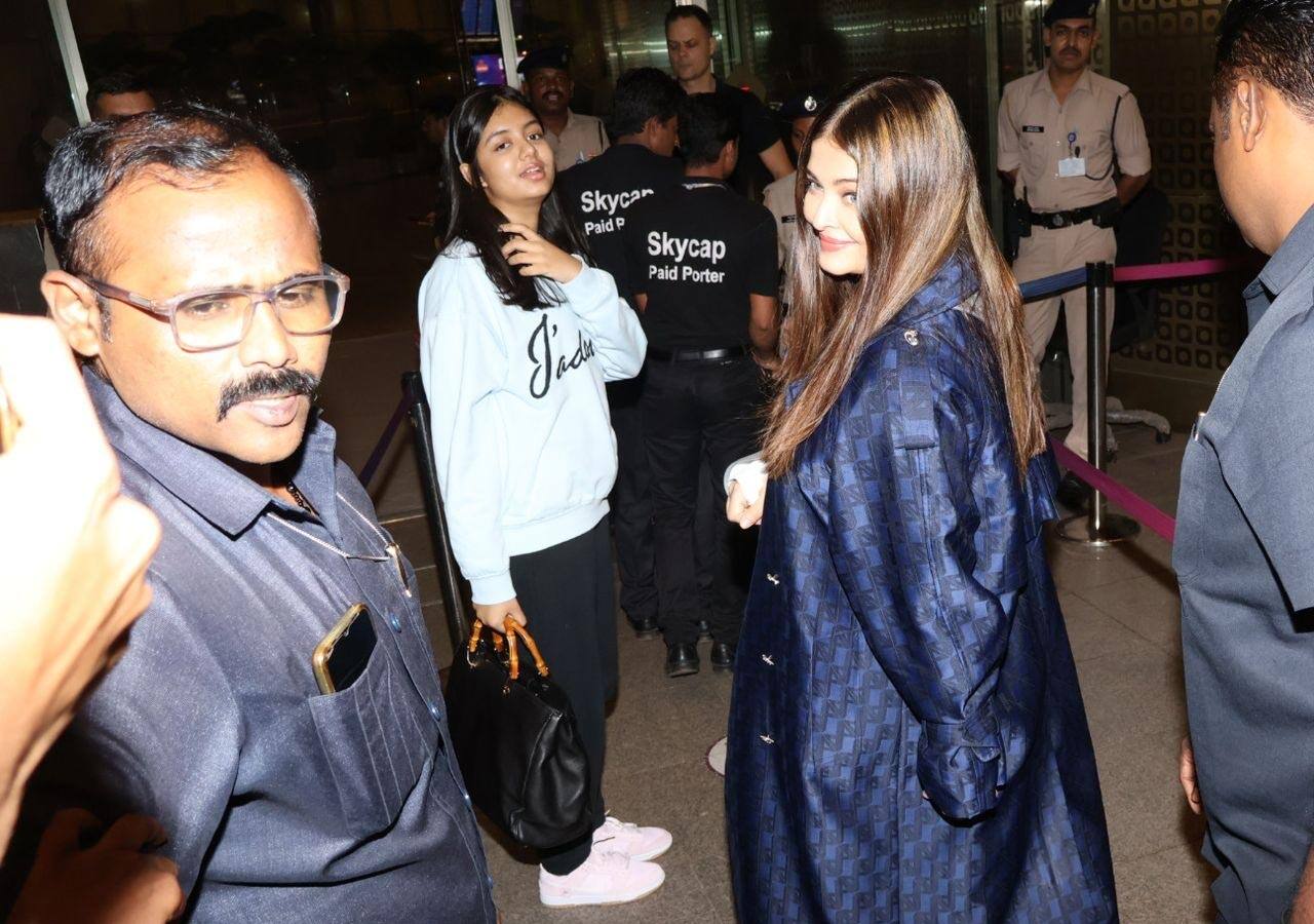 Aishwarya Rai Bachchan waves at the paps