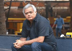 Hansal Mehta gives a befitting reply to a troll calling him a 'scumbag' over liplock picture with his wife; 'It's a man...'