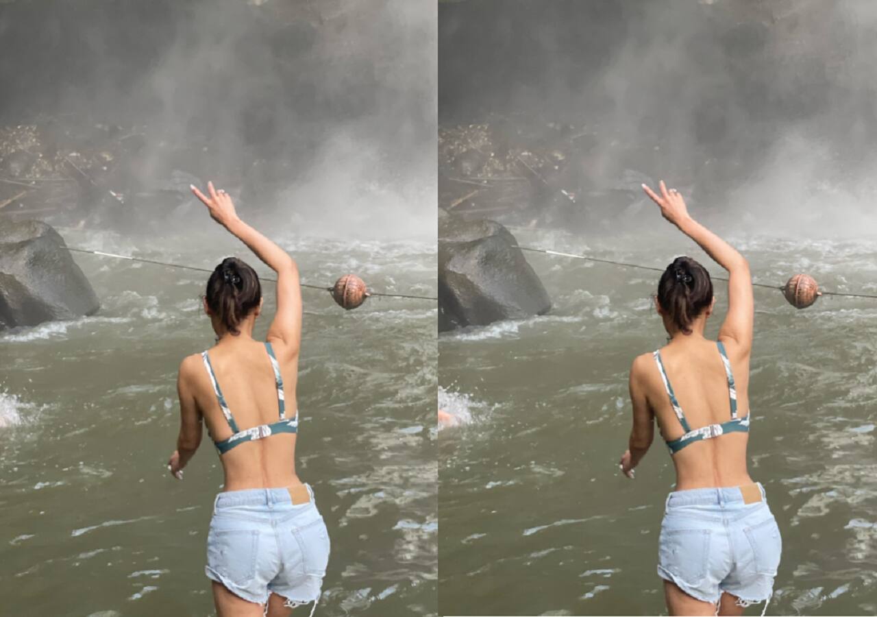Mouni Roy takes a dip in the waterfall