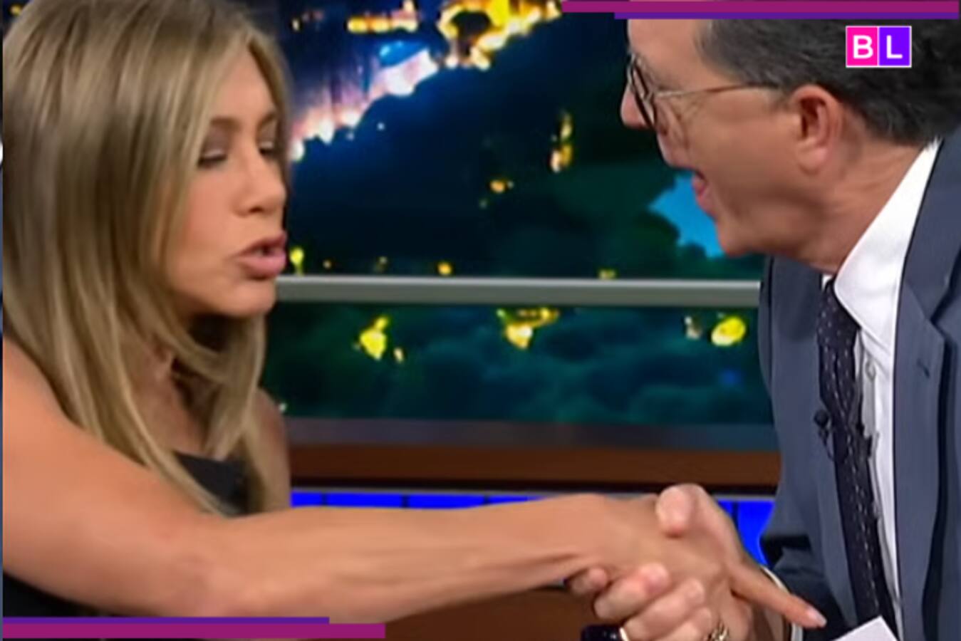 'Not In The Script': Jennifer Aniston Jokes and Stops Stephen Colbert When He Tries to Kiss Her...