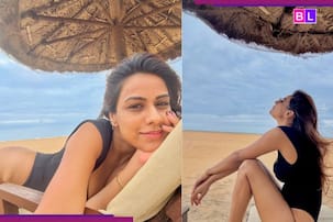 ब्लैक मोनोकिनी में समंद्र किनारे Nia Sharma ने दिखाया परफेक्ट फिगर, सिजलिंग पोज देख फैंस हुए पानी-पानी! हर एंगल है किलर