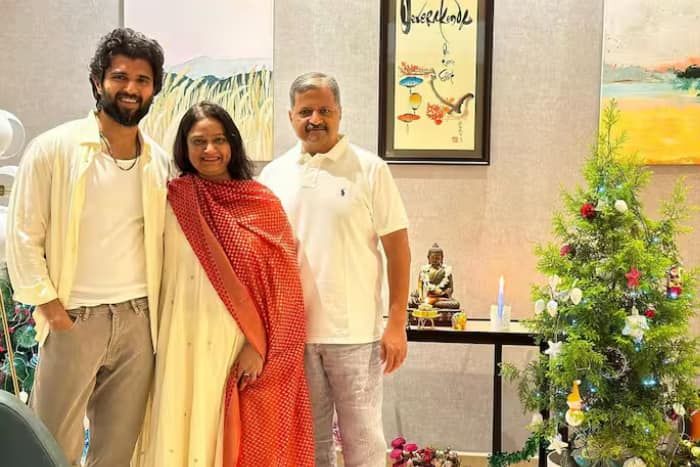 Vijay lives with his father, mother and...