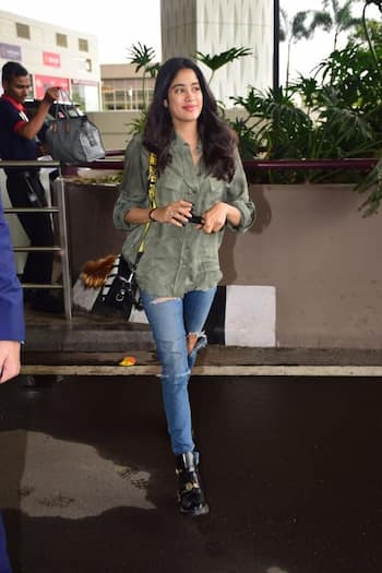 Anushka Sharma picks a quirky green shirt for her airport look
