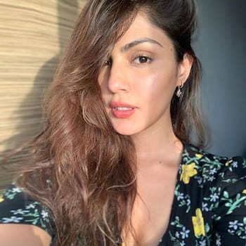 Rhea Chakraborty Looks Uber-Hot In A Front Mini-Slit One Piece At