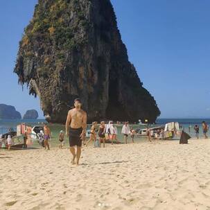 Zain Imam walks shirtless on the beach, and we think he looks like our next crush