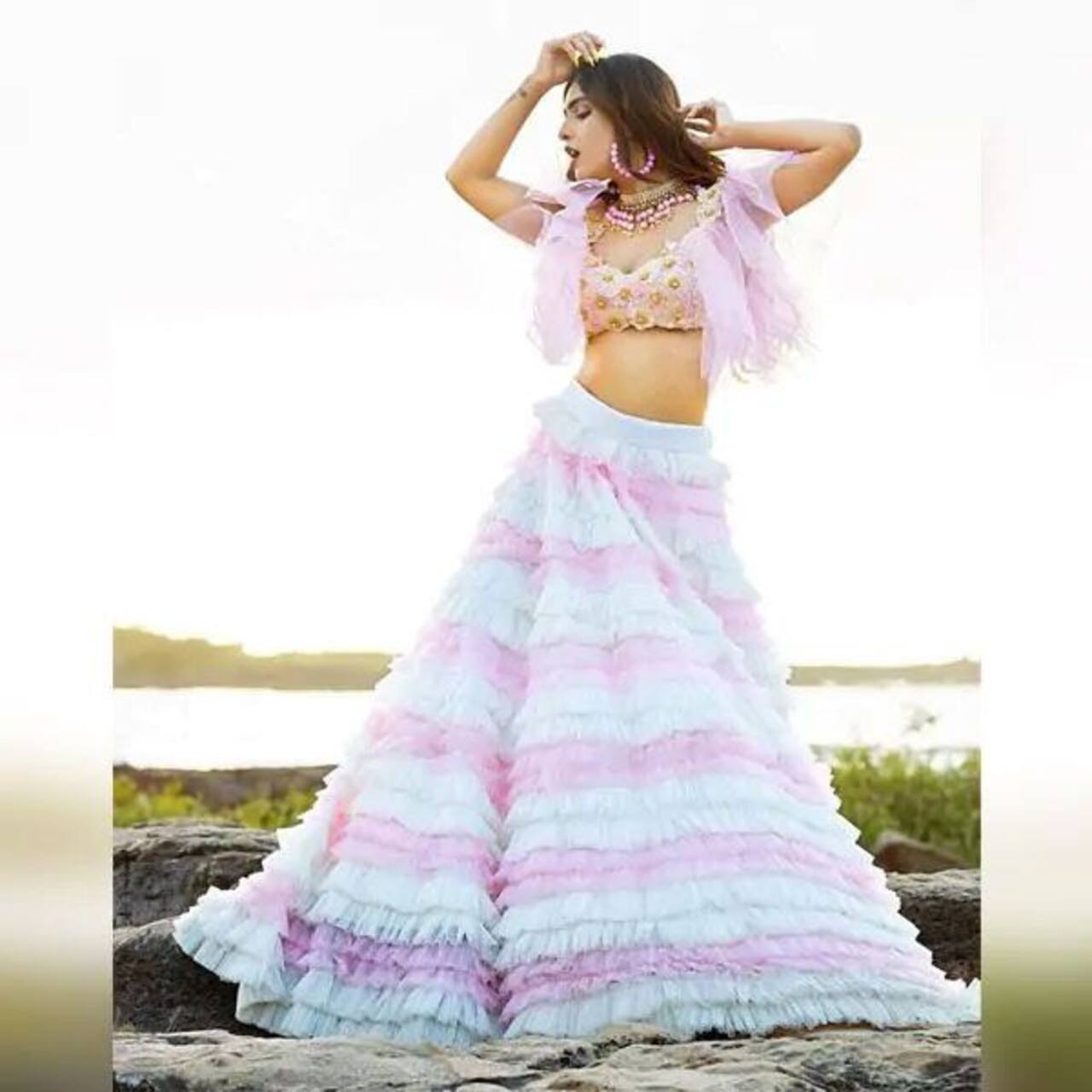 Punjabi actress Neha Malik sizzles in a bathrobe for her latest photoshoot