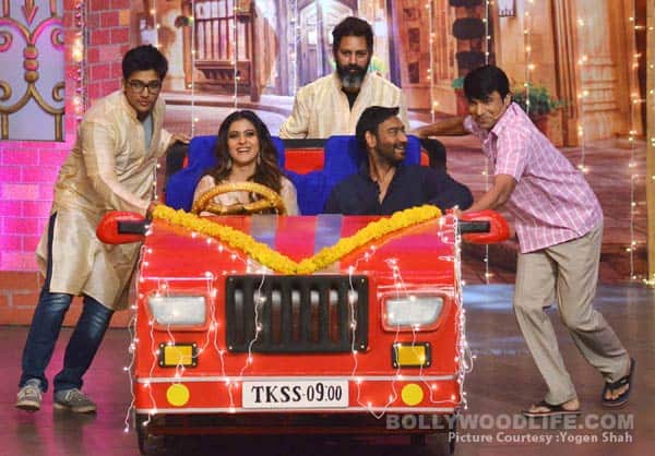 Ajay Devgn and Kajol make a flashy entry at The Kapil Sharma driving in the car.