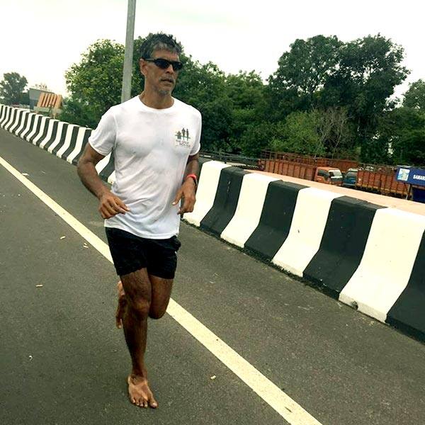 Ironman Milind Soman is running barefoot from Ahmedabad to Mumbai, see ...