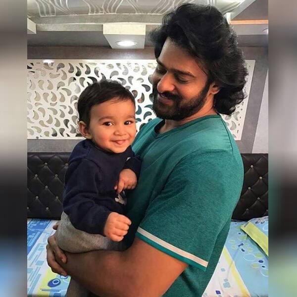 Baahubali actor Prabhas holding a toddler in this picture is breaking ...